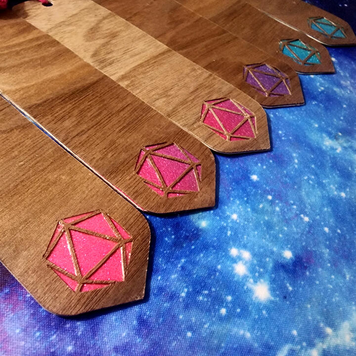 Handmade Bookmarks Wooden bookmarks with d20 cutout.